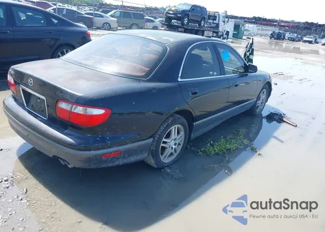 2000 Mazda Millenia z USA, uszkodzony, nr VIN JM1TA2210Y1614323